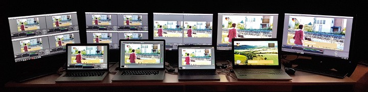 Multi-Kamera Livestream Setup mit Monitoren und Laptops, die verschiedene Kamerawinkel einer Person in pinker Kleidung zeigen